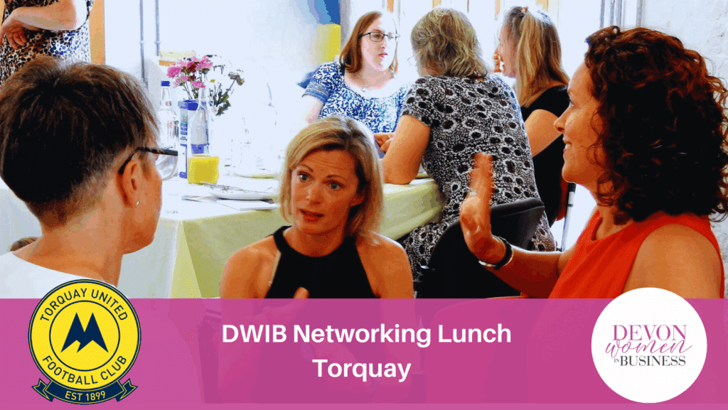 Women chatting at a Devon Women in Business Networking event. Pink banner advertising the DWIB Networking Lunch at Torquay. Logo: Torquay United FC Logo: Devon Women in Business
