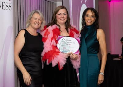 Louise Jenner and Margaret Oscar present Tanya Rowe with her DWIB Award for winning Employer of the Year 2025.