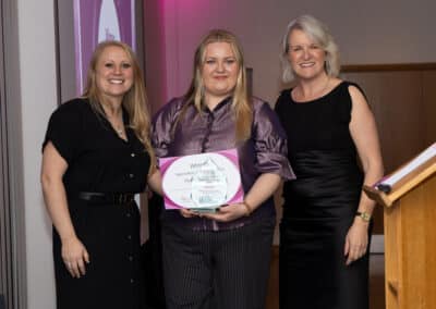 Katy Hensby and Louise Jenner present the DWIB award for Apprentice of the Year 2025 to Sophie Piccioni-Vero