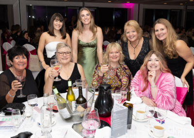 Guests at the DWIB Awards 2025 in a group shot at their table.