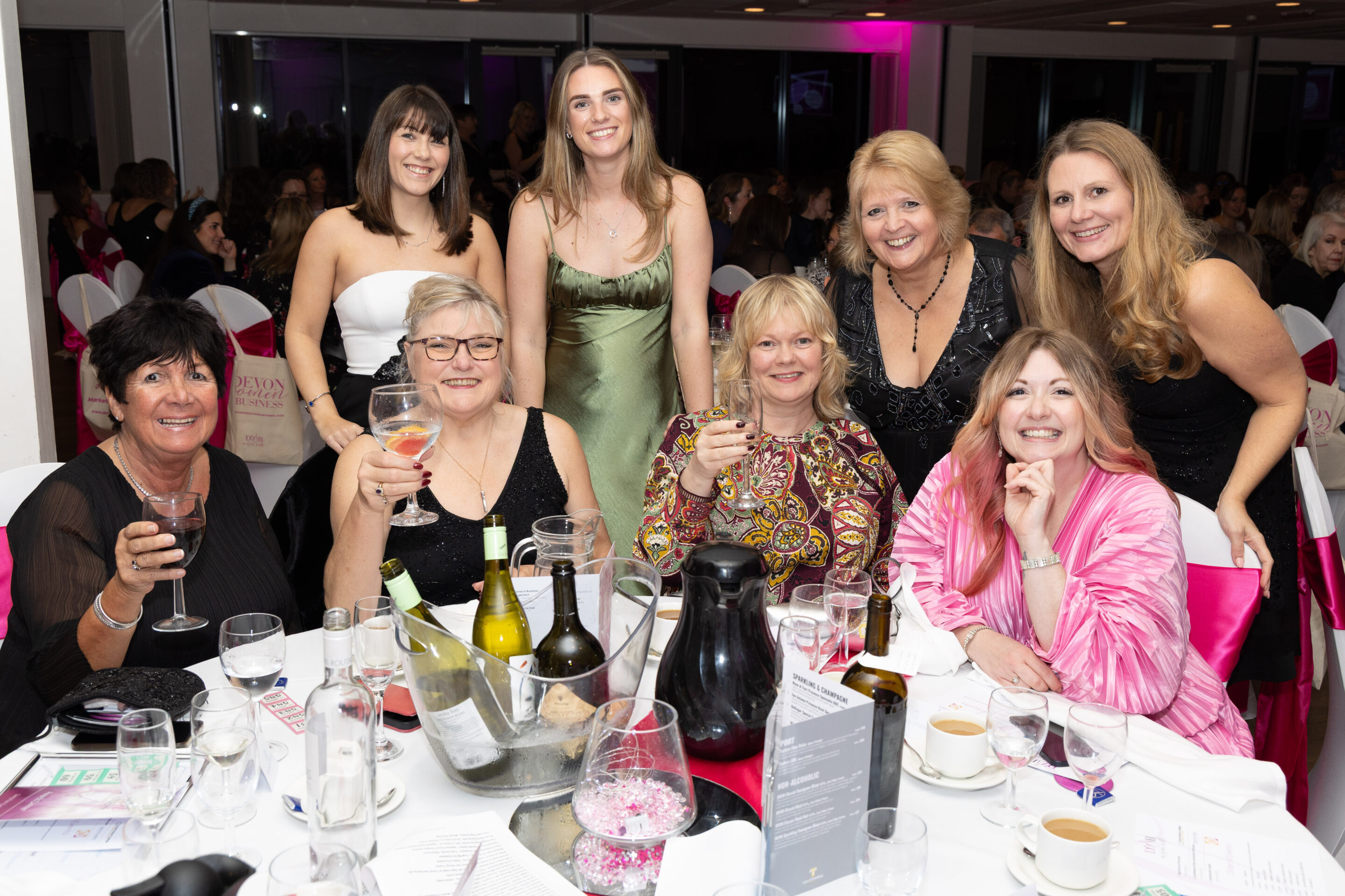Guests at the DWIB Awards 2025 in a group shot at their table.