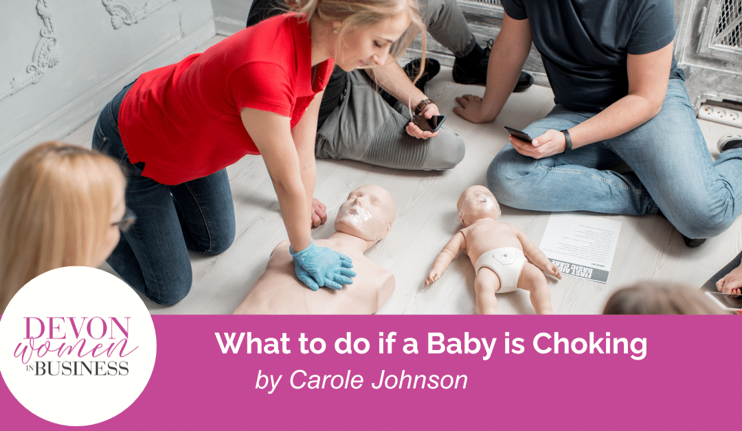 Instructor demonstrating baby choking first aid techniques during a training session, using infant mannequins, for a Devon Women in Business Top Tips article.