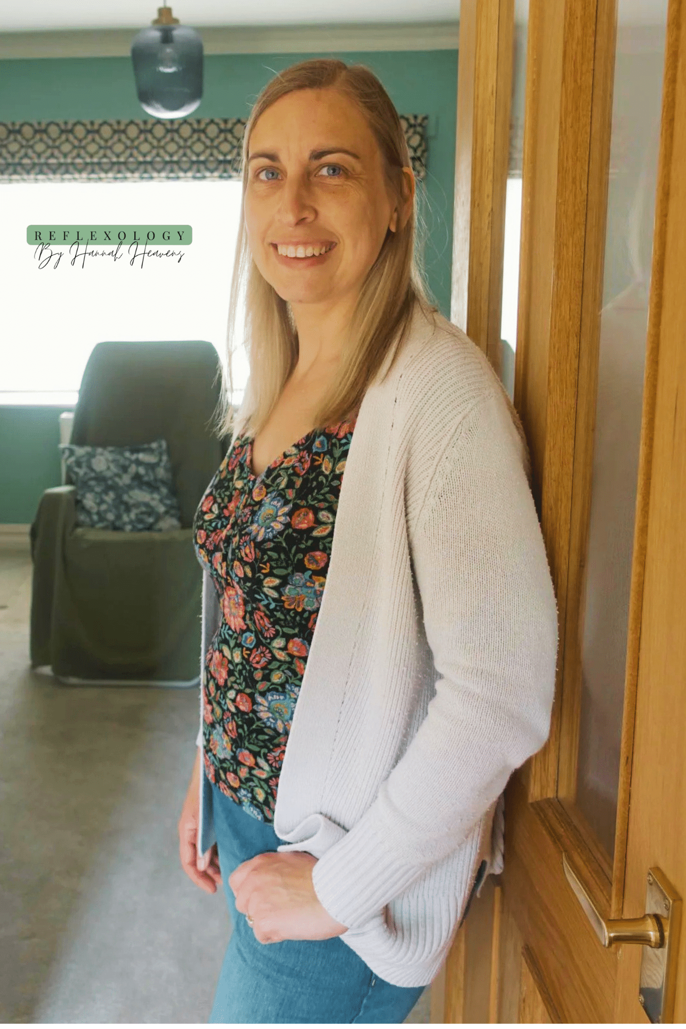 Reflexology by Hannah Heavens (1) Hannah Heavens standing in her open doorway ready to welcome a reflexology client.